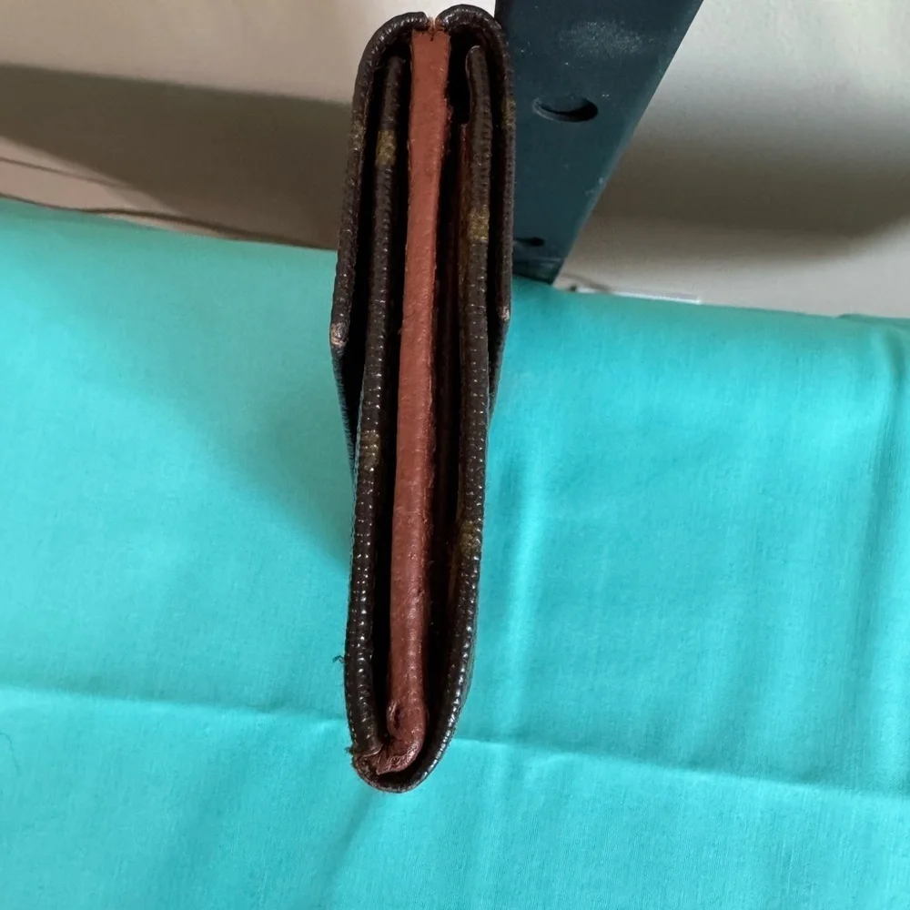 Louis Vuitton Double. Snap Monogram Wallet